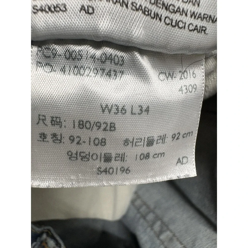 Levis 560 Jeans Mens Measured 35x31 Blue Relaxed Fit‎ Distressed Straight Leg
